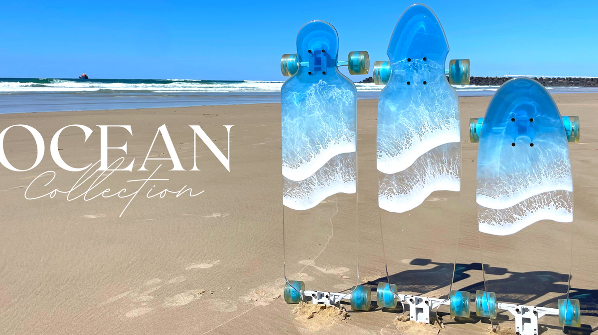 Three original Ocean Collection acrylic boards with blue and white resin wave artwork.