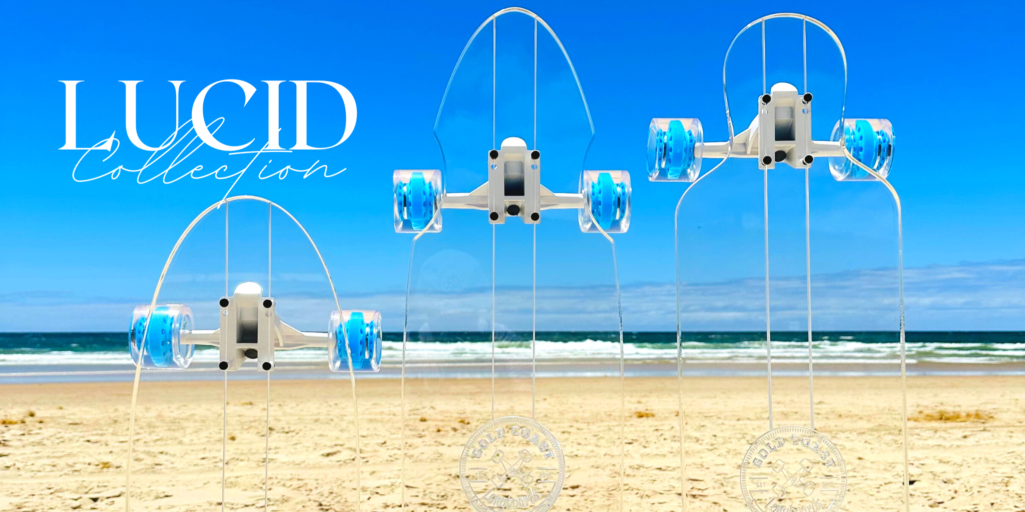 Three transparent Lucid Collection boards with engraved lines and blue wheels.